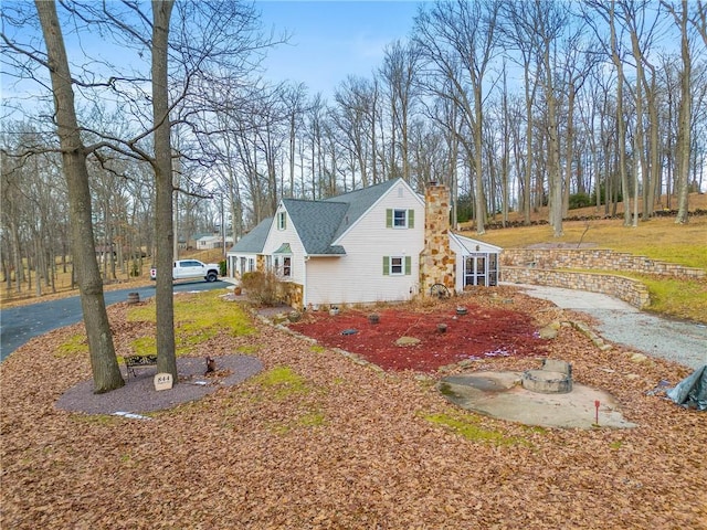 view of home's exterior featuring a sunroom