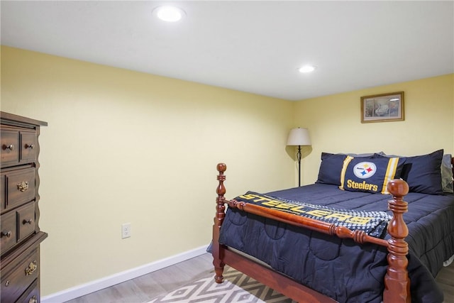 bedroom with light wood-type flooring