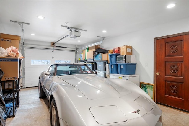 garage featuring a garage door opener