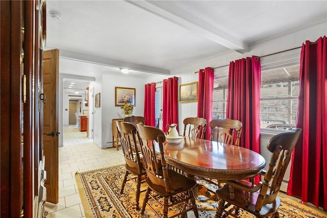 tiled dining room with beam ceiling, a baseboard radiator, and ornamental molding