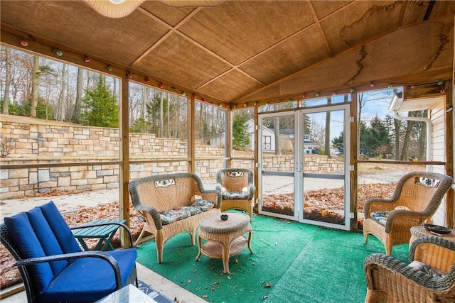 sunroom with wood ceiling and vaulted ceiling