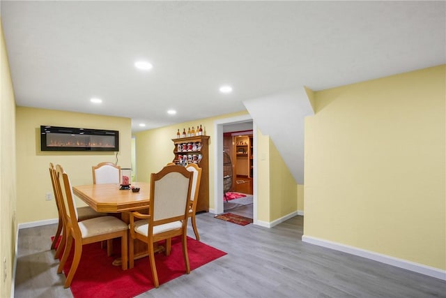 dining room with hardwood / wood-style flooring