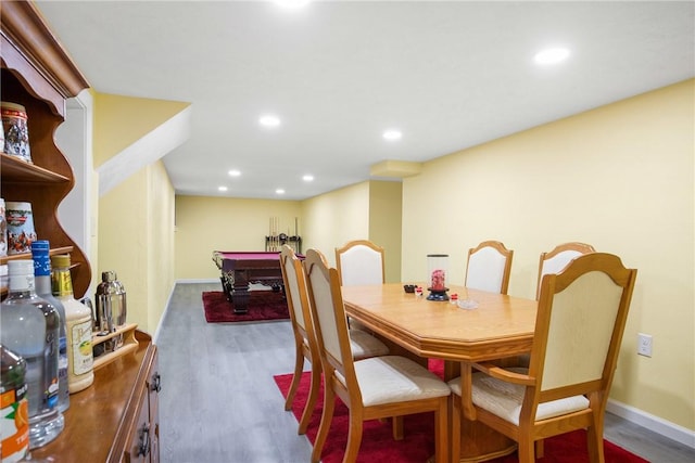 dining area with dark hardwood / wood-style flooring and pool table