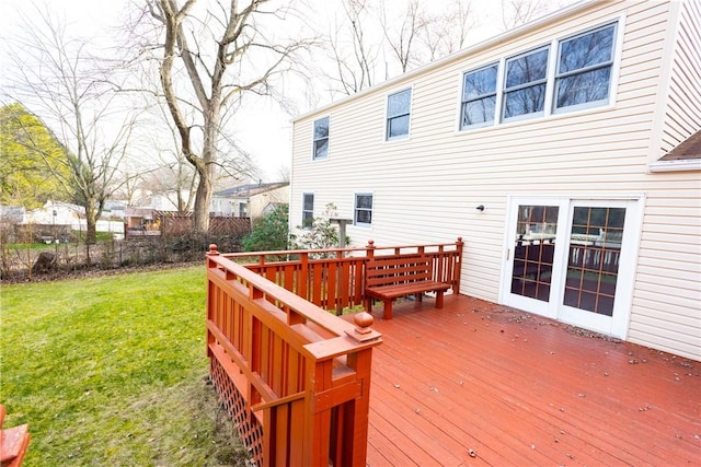 wooden deck with a yard