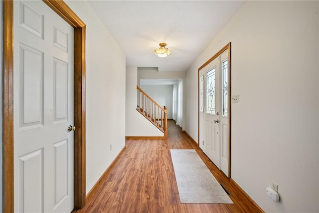 entrance foyer with hardwood / wood-style floors