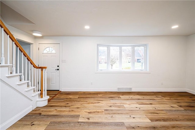 entrance foyer with light hardwood / wood-style floors