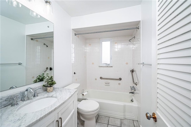 full bathroom with vanity, toilet, and tiled shower / bath