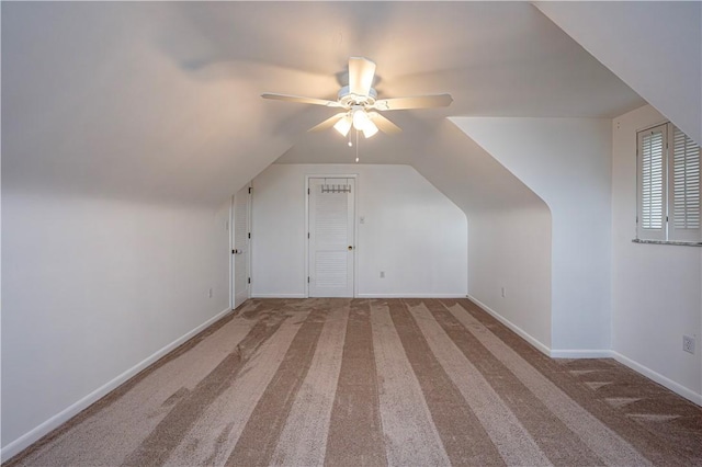 bonus room featuring lofted ceiling, ceiling fan, and carpet floors