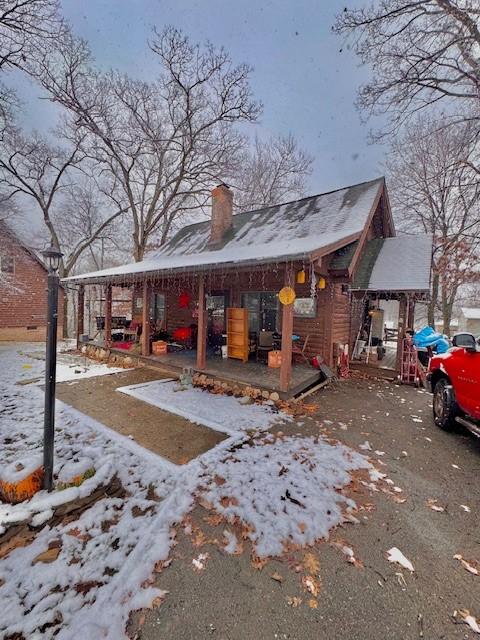 view of snow covered property