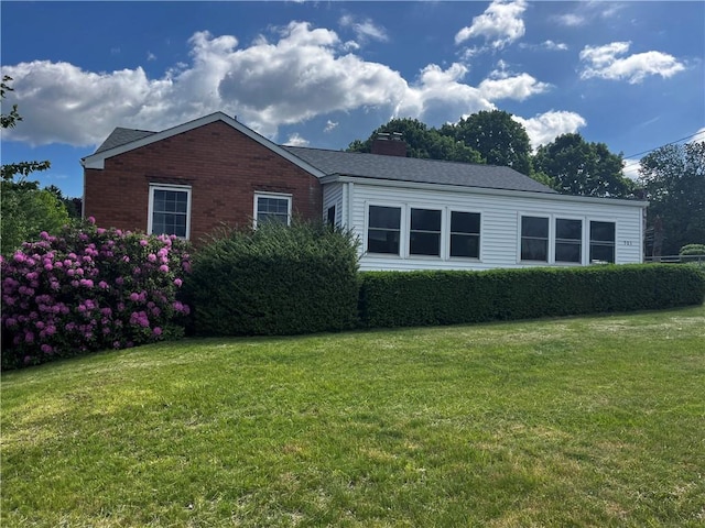 503 Melvin Dr, City Of Greensburg, PA 15601 - view of property exterior featuring a yard and a chimney
