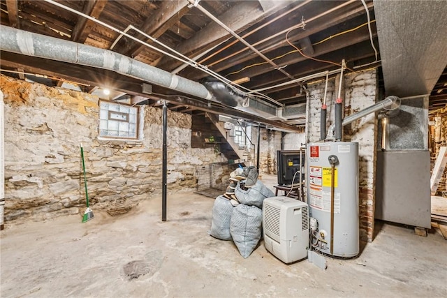 basement with heating unit and water heater