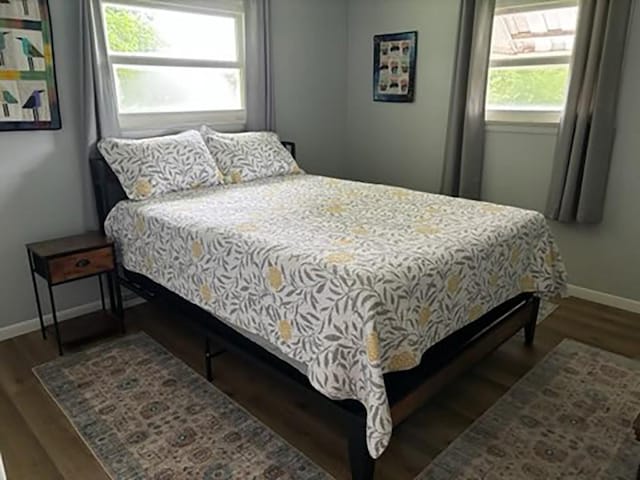 bedroom featuring wood-type flooring