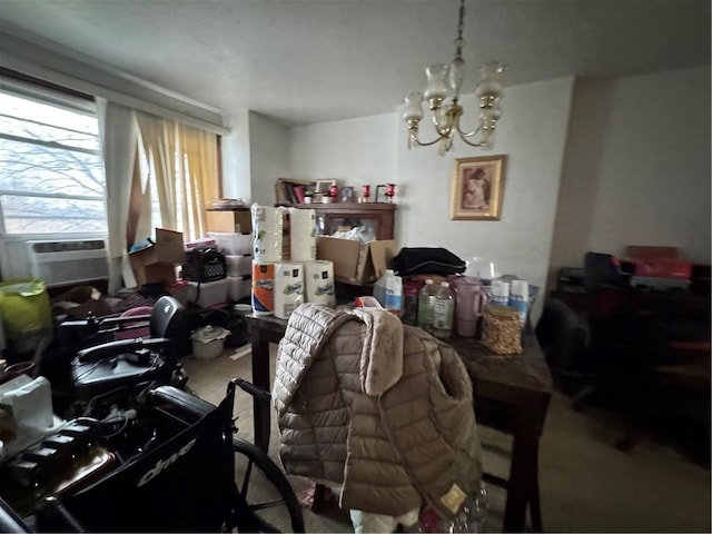 interior space with cooling unit and a chandelier