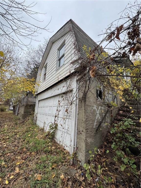 view of home's exterior with a garage