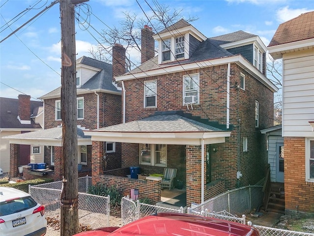 view of front facade featuring a porch and cooling unit