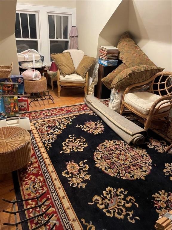 living area with wood-type flooring