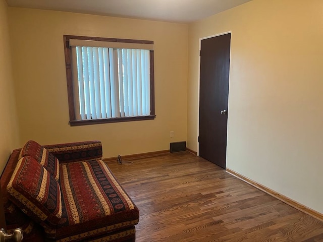 living area featuring hardwood / wood-style flooring