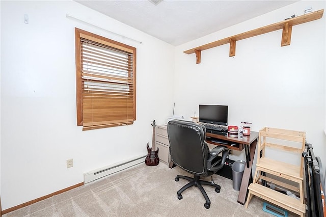 carpeted office space with a baseboard heating unit