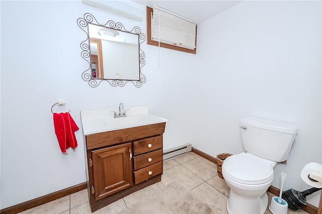 bathroom featuring tile patterned floors, vanity, a baseboard radiator, and toilet