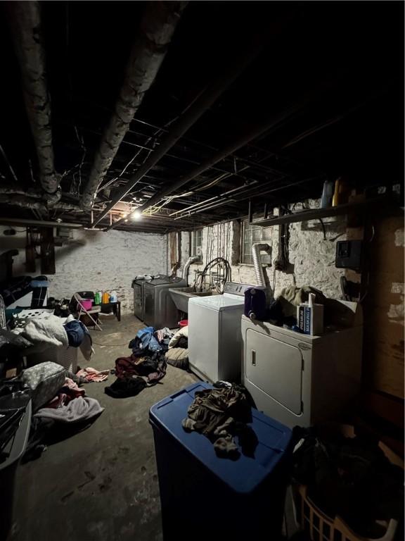 interior space with washing machine and clothes dryer