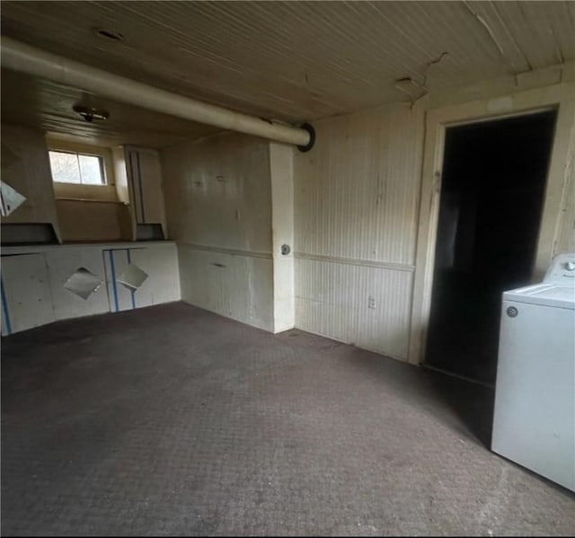 interior space with washer / dryer and wood ceiling