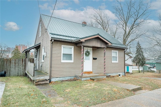 bungalow with a front lawn