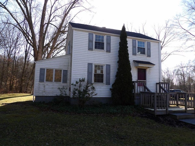 view of front of home with a front yard