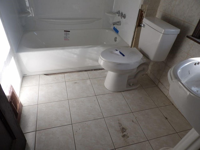 bathroom with tile patterned flooring and toilet