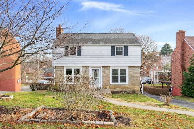 view of front of house with a front yard