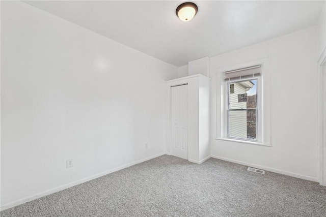 empty room with carpet floors