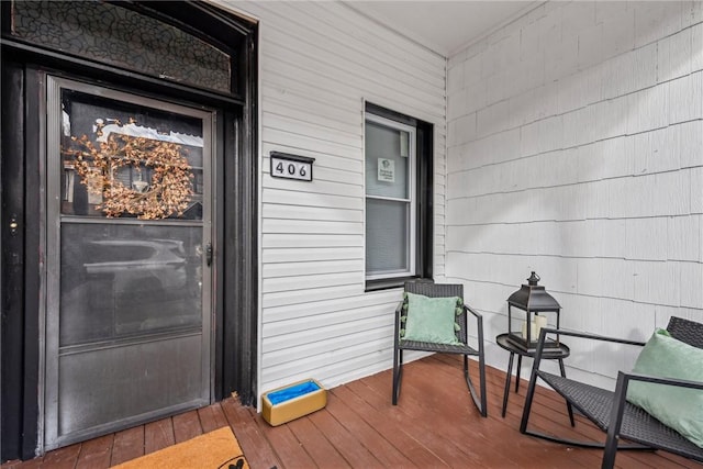 entrance to property featuring a porch