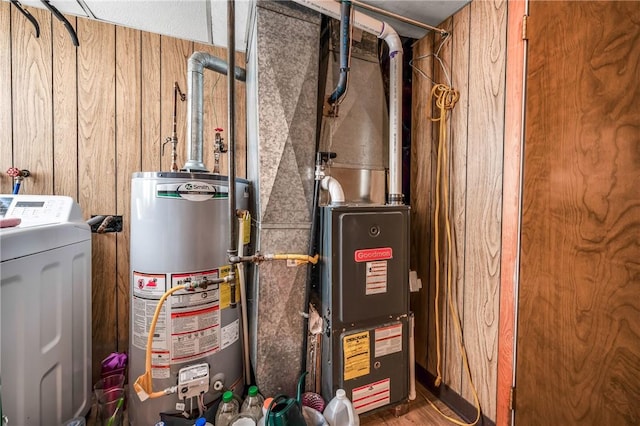 utility room featuring washer / clothes dryer and water heater