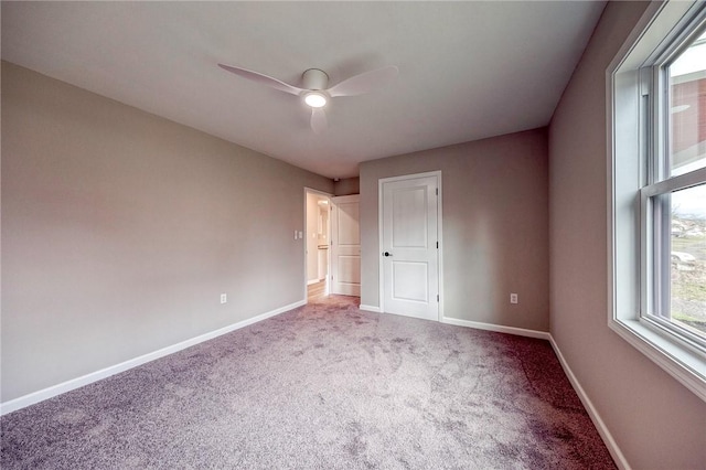 unfurnished bedroom with carpet floors and ceiling fan