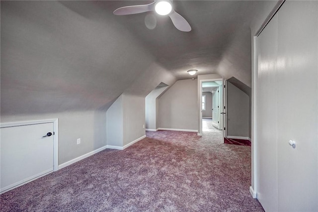 bonus room featuring carpet, vaulted ceiling, and ceiling fan