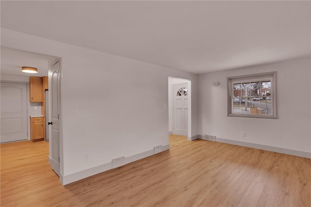 empty room featuring light hardwood / wood-style flooring