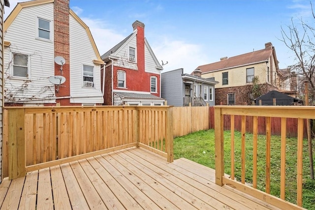 wooden deck with a yard