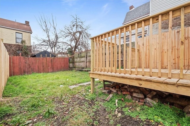 view of yard featuring a wooden deck