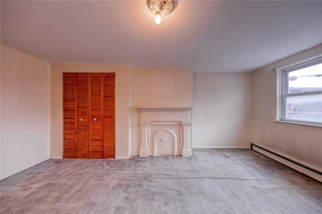 unfurnished living room featuring light colored carpet and a baseboard radiator