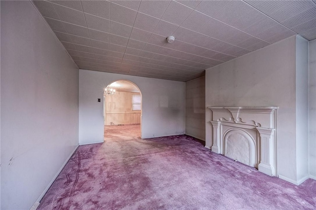 unfurnished living room featuring carpet flooring