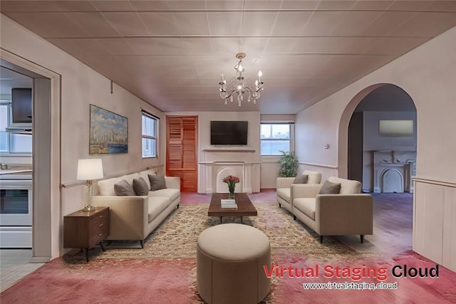 living room featuring a notable chandelier