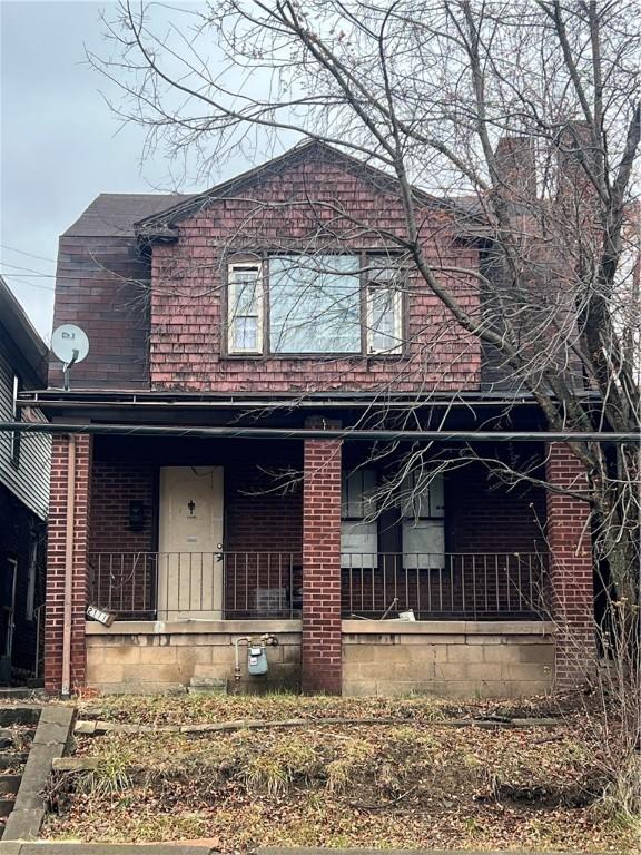 view of front of house featuring covered porch