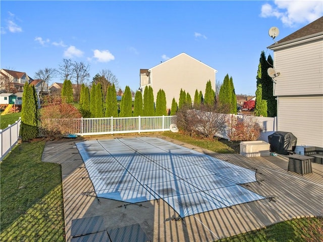 view of pool with grilling area