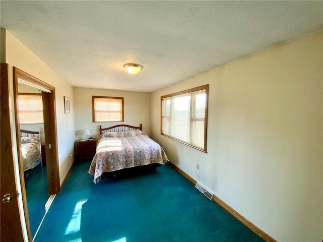 unfurnished bedroom with carpet flooring