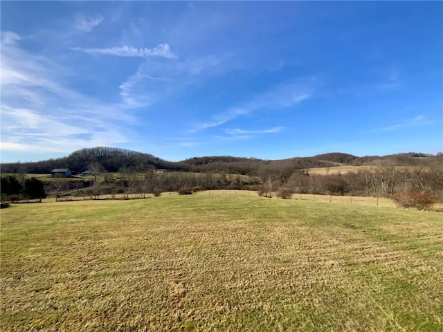 view of mountain feature featuring a rural view