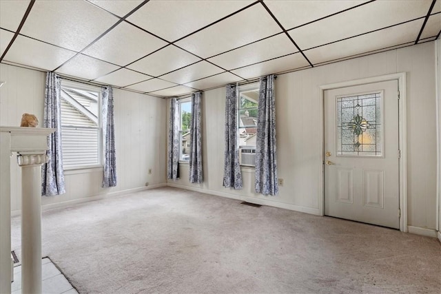 view of carpeted foyer