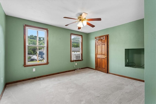 interior space featuring ceiling fan and cooling unit