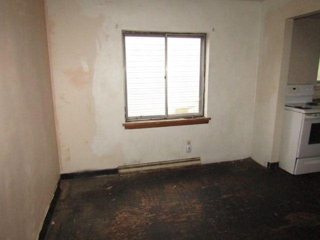 empty room featuring a baseboard heating unit