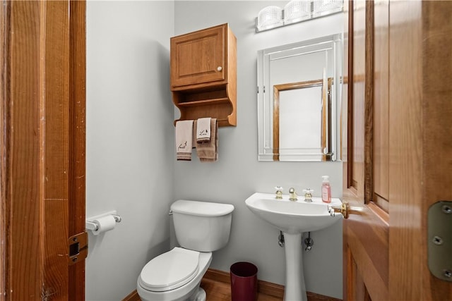 bathroom featuring toilet