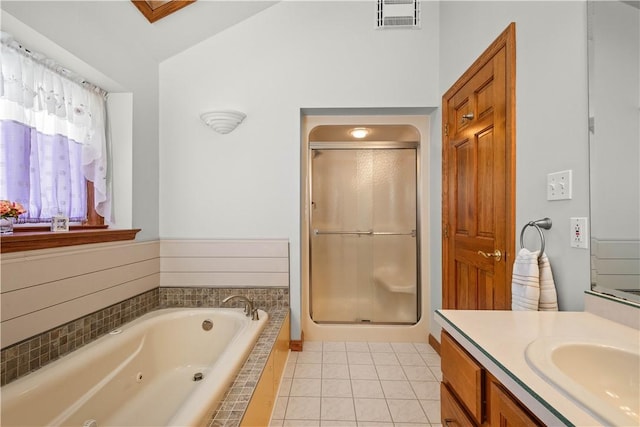 bathroom with tile patterned floors, vanity, and plus walk in shower