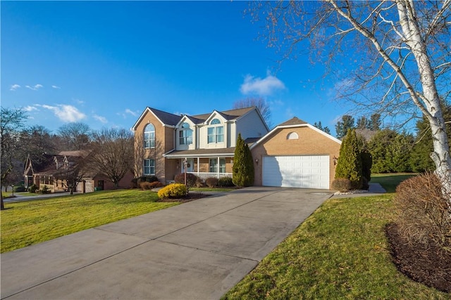 view of property featuring a front yard and a garage